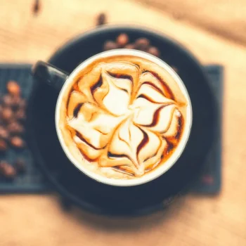 top-view-of-fresh-arabic-aromatic-espress-coffee-with-milk-served-in-restaurant-soft-effect.jpg